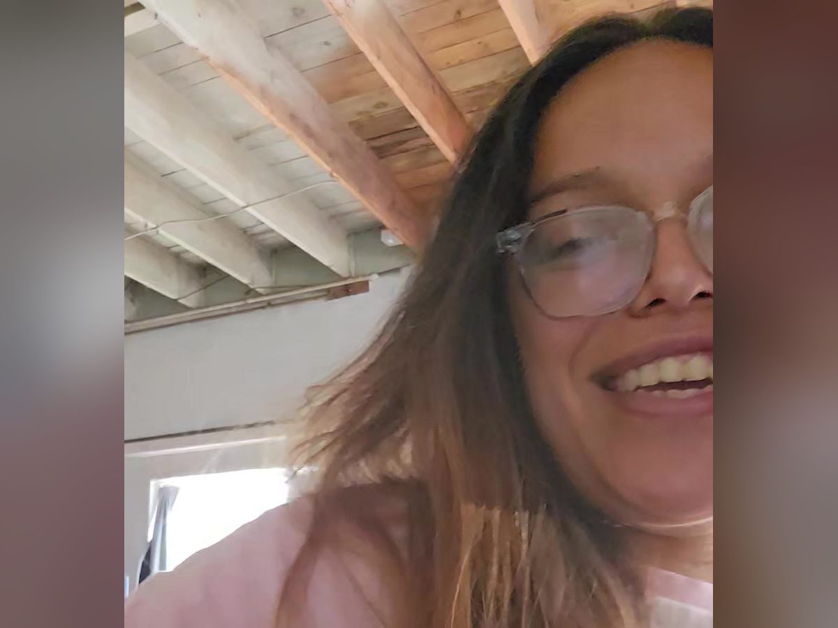 Mia laughing in a selfie inside Midtown Meetup