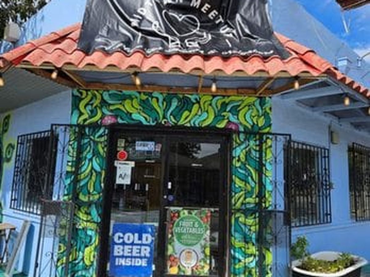 The mural covered front door of Midtown Meetup
